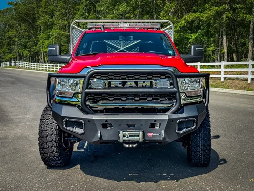Right-side lower body detail with intake/fill fittings and marker lights.